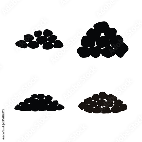 Four clusters of irregularly shaped black objects arranged in a square formation.