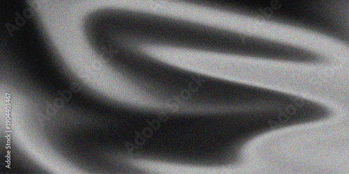 Smooth black and white silk fabric texture with luxury satin waves and a soft shiny drapery pattern for fashion textile material backdropSmooth black and white silk fabric texture with luxury satin wa