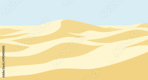 Endless golden sand dunes under a clear pale blue sky