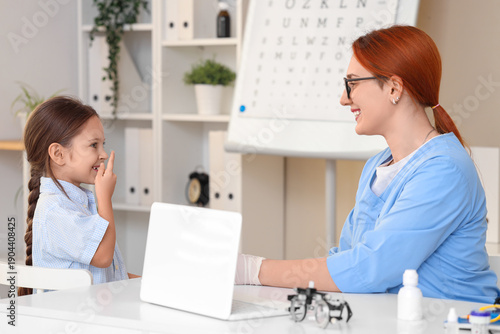 Female ophthalmologist and ...