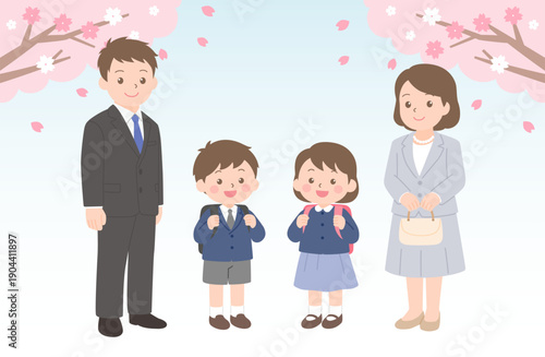 桜の下で入学を迎える新一年生の家族