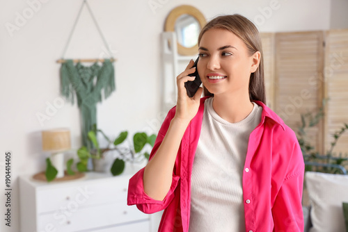 Smiling young woman talking...