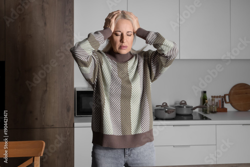 Mature woman having panic a...