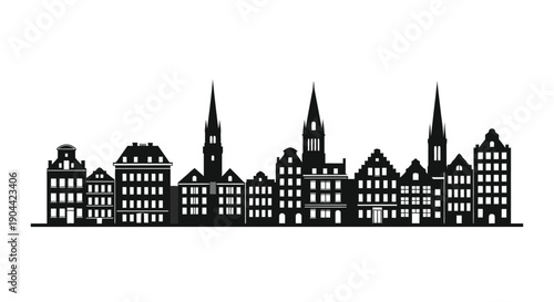 Silhouette of historical European cityscape featuring traditional gabled houses and tall church spires
