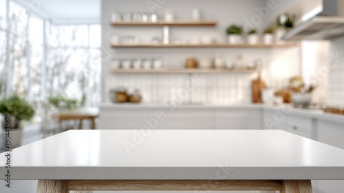 A clean white table surface with a blurred kitchen background, empty center for food product placement