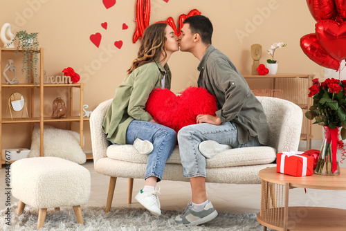 Young couple with heart-sha...