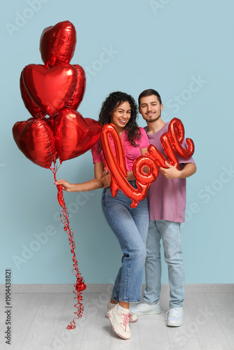 Young couple with air ballo...