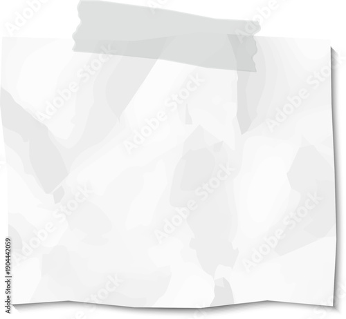 Wrinkled blank paper sheet taped to surface