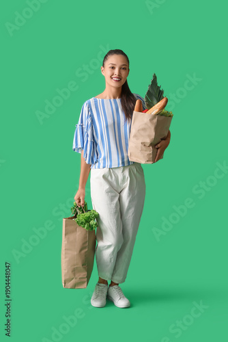Young Asian woman with shop...