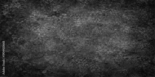 A dark and vintage black and white grunge background featuring a heavily textured stone wall pattern with a rough grey concrete surface and a dirty paper design for a blank industrial backdrop