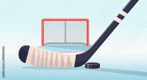 A hockey stick rests on a rink next to a puck and goal