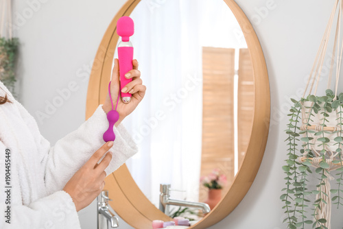 Woman with vibrator and ana...