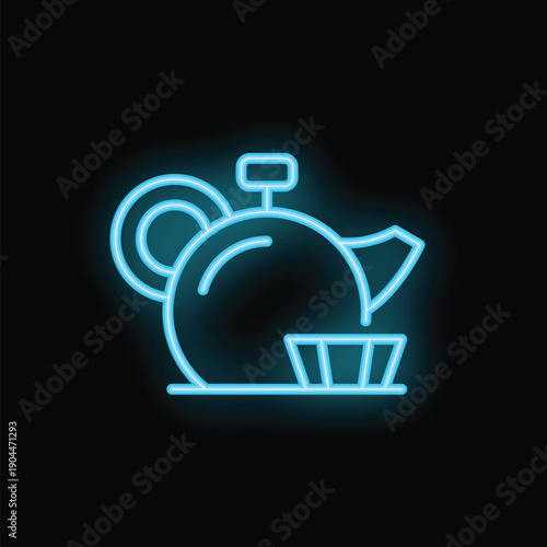 Bright blue neon sign of a teapot with a lid, cup and saucer glowing on a black background