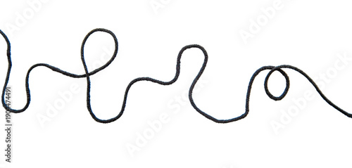 Black thread isolate on white background. Selective focus. Old.