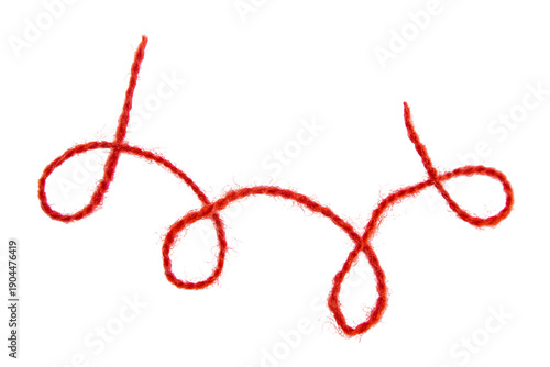 Fotografija Red thread isolate on white background. Selective focus. Old.