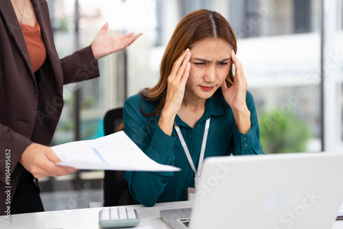 Fotografi Chief and subordinate talking at workplace, dissatisfied boss points on rude mistakes on report criticizing work scolding accusing young female employee