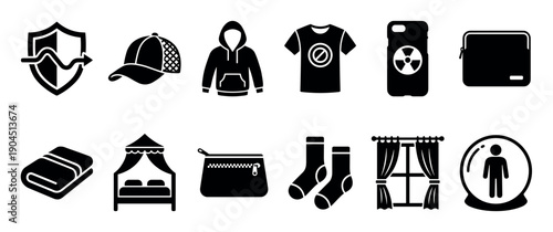 Set of twelve black silhouette icons depicting clothing, accessories, home items, and abstract protection symbols in a minimalist vector graphic style
