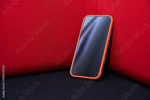 Smartphone on Red Background - Modern Technology Concept