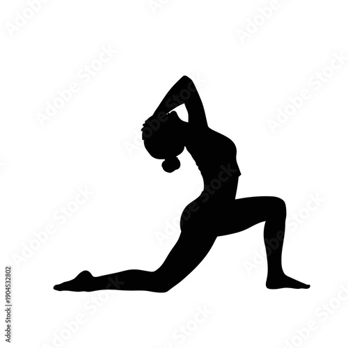 Silhouette of a woman practicing yoga in a lunge pose.