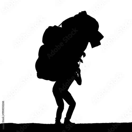 Silhouette of person carrying heavy load on back.