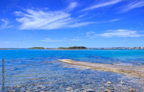 Salento seascape with the Isola Grande near town of Porto Cesareo, Apulia region in southern Italy.