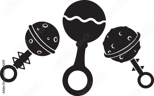 A collection of three black silhouette rattles baby toys and infant objects