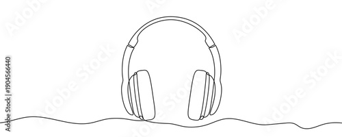 Headphones in line art style. Minimalist drawing of an audio accessory made in a continuous line. Vector illustration.