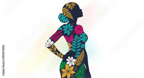 Woman in colorful floral dress with tropical leaves and flowers pattern standing confidently