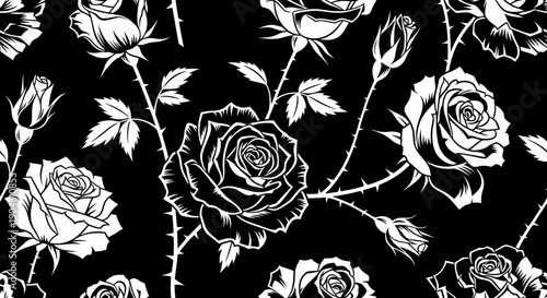 Black and white illustration of roses and leaves on a dark background.