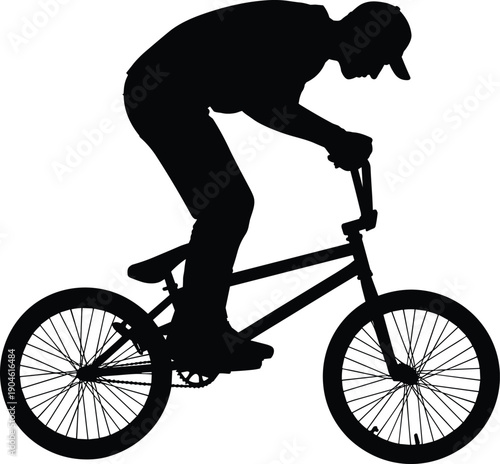 Black silhouette of man riding bicycle bike