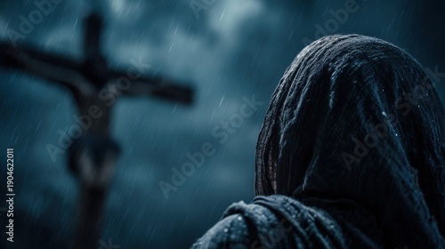 Woman grieving at the foot of Christ on the cross during rain. Holy Week and Passion Week event. Biblical scene for Easter.