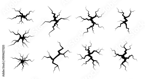Set of eight different ground crack and fracture patterns in black silhouette for creating earthquake or damaged surface effects.