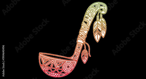 Ethnic decorative ladle with intricate patterns and hanging feathers on black background