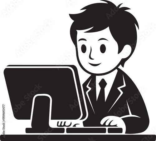 A young man in a suit working diligently on a desktop computer