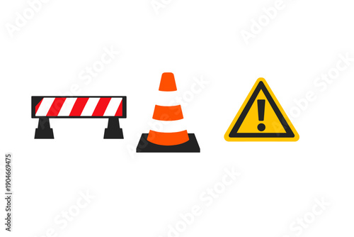 Construction barriers and warning signs are set up on a road to indicate ongoing work in the area near a busy intersection during daylight hours