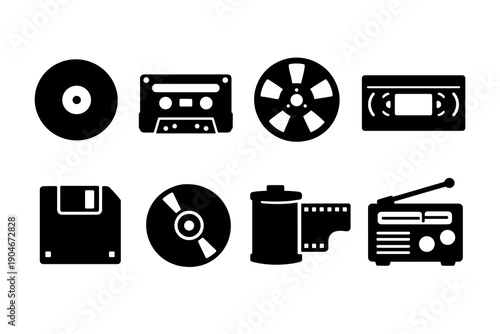 Minimal black silhouette style retro media icon set with cassette tape, vinyl record, floppy disk, film reel and radio symbols isolated on white background