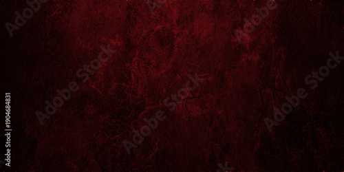 An aged red wood texture with a dark grunge pattern and rusty metal paint creates a vintage textured backdrop for an old dirty wall design