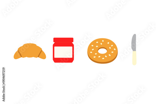 Breakfast items on a table with a croissant, jar, bagel, and knife in a simple layout during morning hours