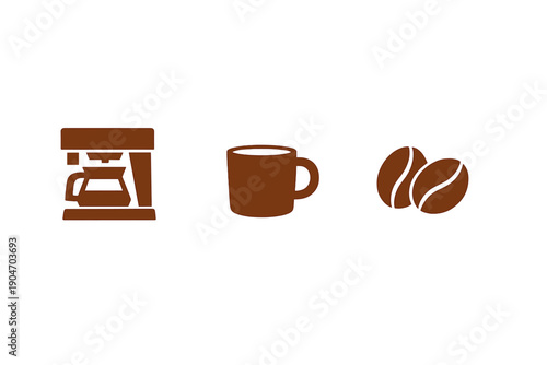 Coffee maker, cup, and coffee beans show process of making coffee at home in early morning hours