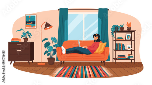 Young woman with headphones relax on orange sofa and working on laptop in cozy modern living room with home plants.