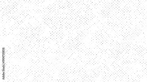 Gray dots on white background. Subtle texture pattern. Abstract background