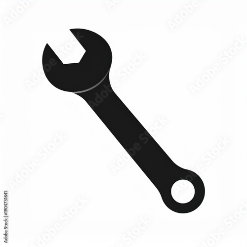A Simple Black Open Ended Spanner Tool Rests On A White Background With A Slight Gray Shadow Effect