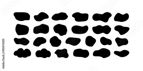 A collection of irregularly shaped black blobs scattered across a white background Vector