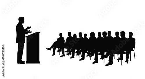 A speaker presenting to an audience in a stark black silhouette