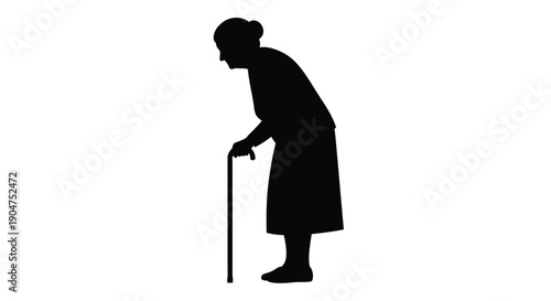 Elderly woman with walking cane in stark black silhouette