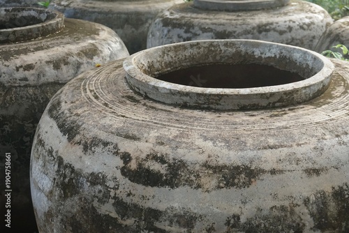 Antique Thai Water Jars: Traditional Earthenware Pottery