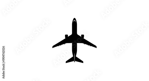 Airplane silhouette flying high in the sky viewed from below