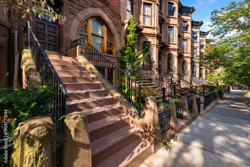 Row of brownstone townhouses in Park Slope Historic District, Brooklyn. Classic residential architecture in New York City, USA