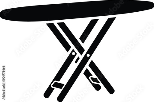 A simple, minimalist black silhouette icon representing a portable folding table with an oval tabletop and x-shaped legs.
