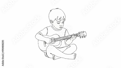 Young boy playing ukulele sitting on the floor.